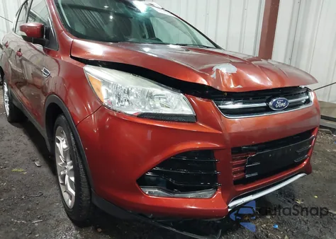 2015 Ford Escape Titanium z USA, uszkodzony, nr VIN 1FMCU9J97FUC02477